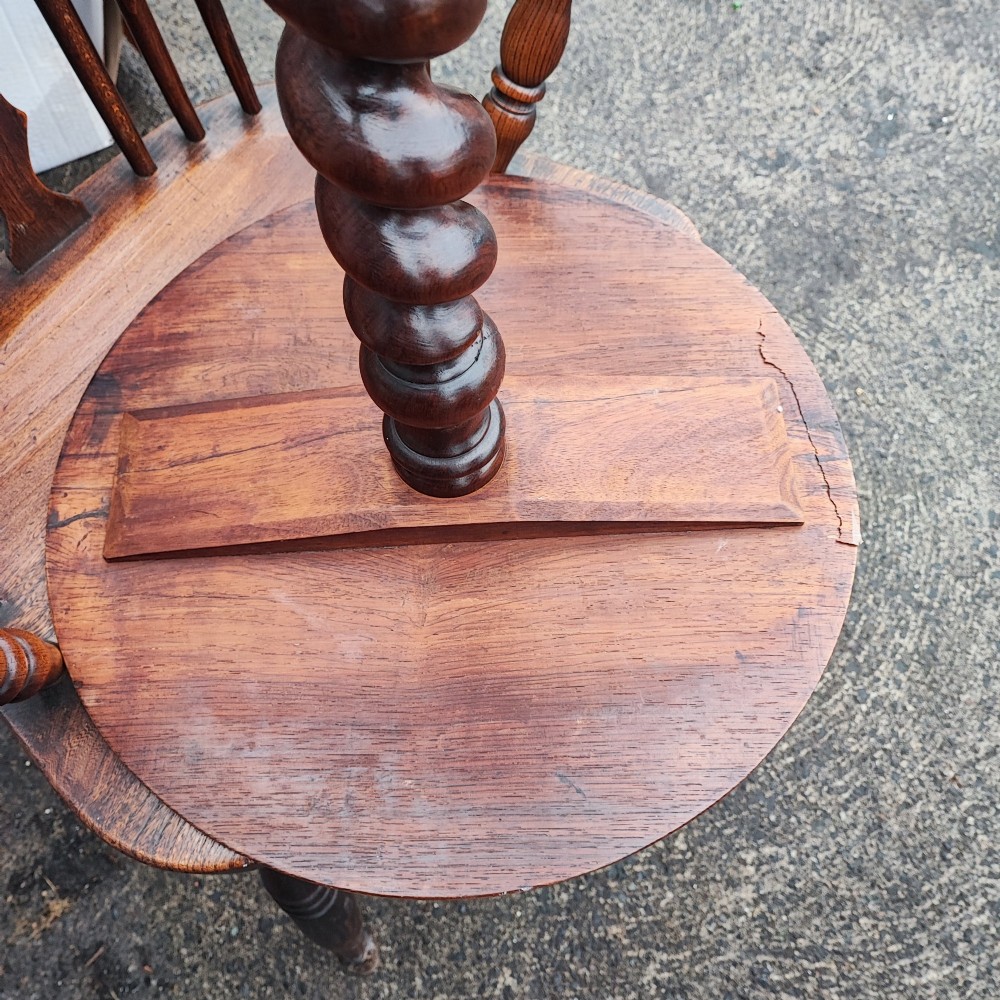 A circular rosewood and walnut wine table with elaborate floral marquetry inlay, supported by a barley twist column and a carved tripod base. View II