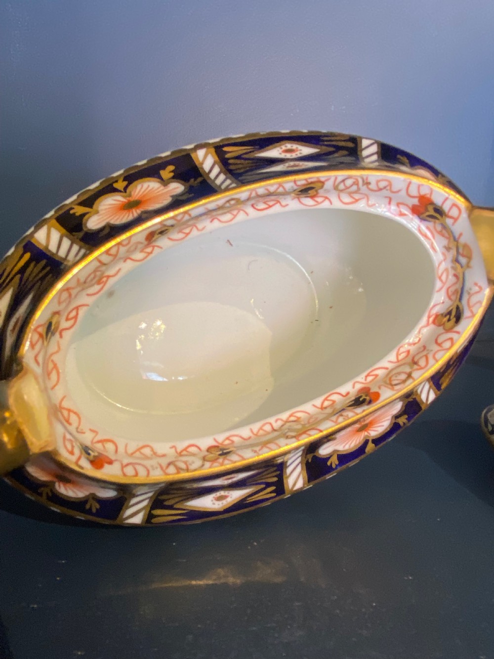An antique Royal Crown Derby porcelain covered sugar bowl with twin handles, decorated in cobalt blue, iron red, and gilt Imari patterns. View VII