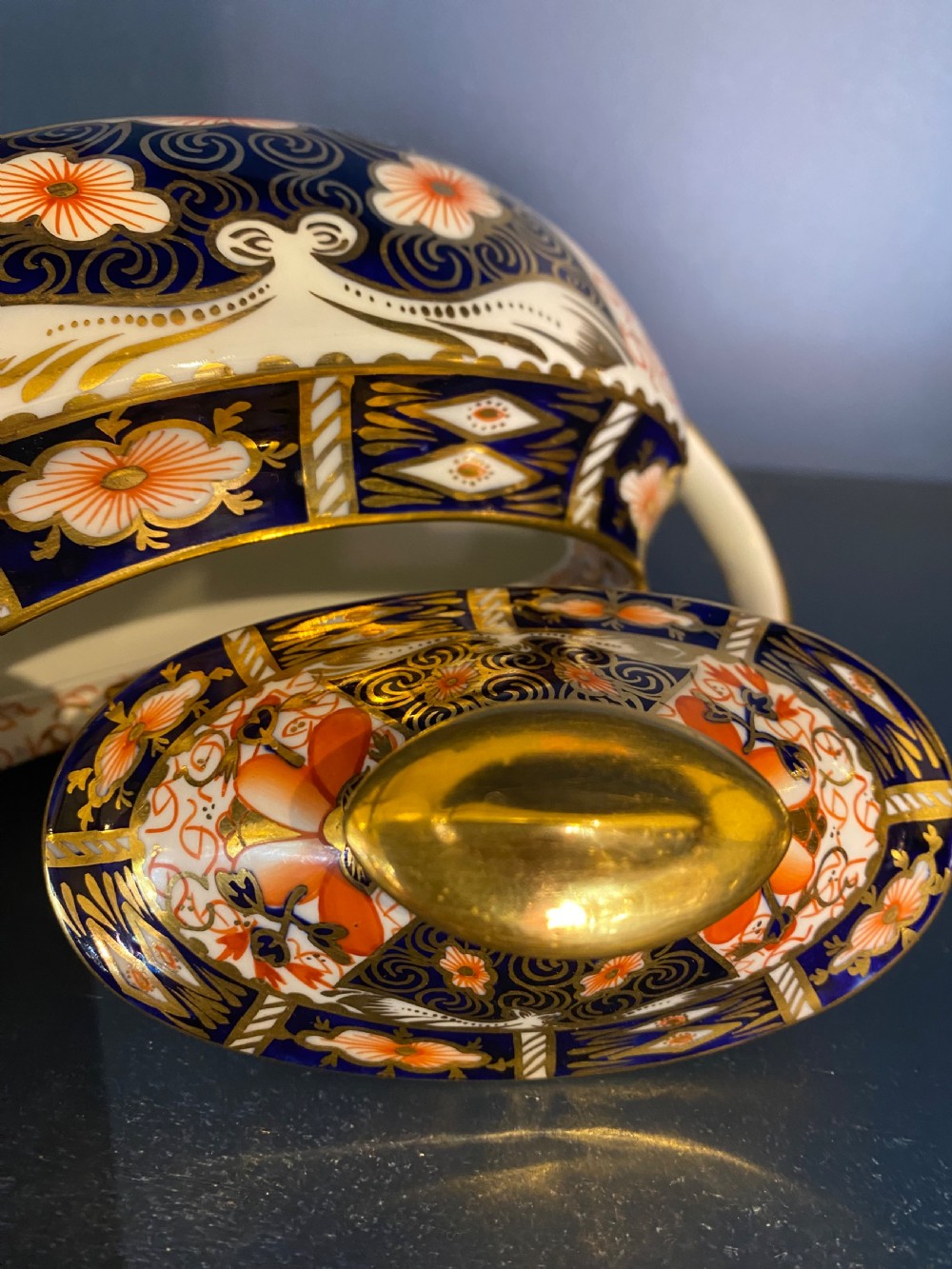 An antique Royal Crown Derby porcelain covered sugar bowl with twin handles, decorated in cobalt blue, iron red, and gilt Imari patterns. View VIII