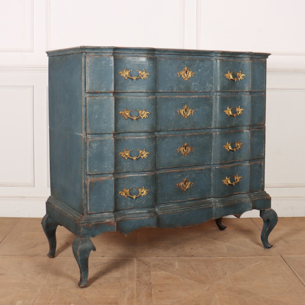 An 18th-century Danish blue-painted chest of drawers featuring a shaped serpentine front, gilt brass hardware, and cabriole legs. View IX