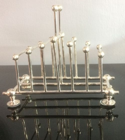 RARE ARTS AND CRAFTS PERIOD SILVER PLATED TOAST RACK - ADDITIONAL PHOTO 1