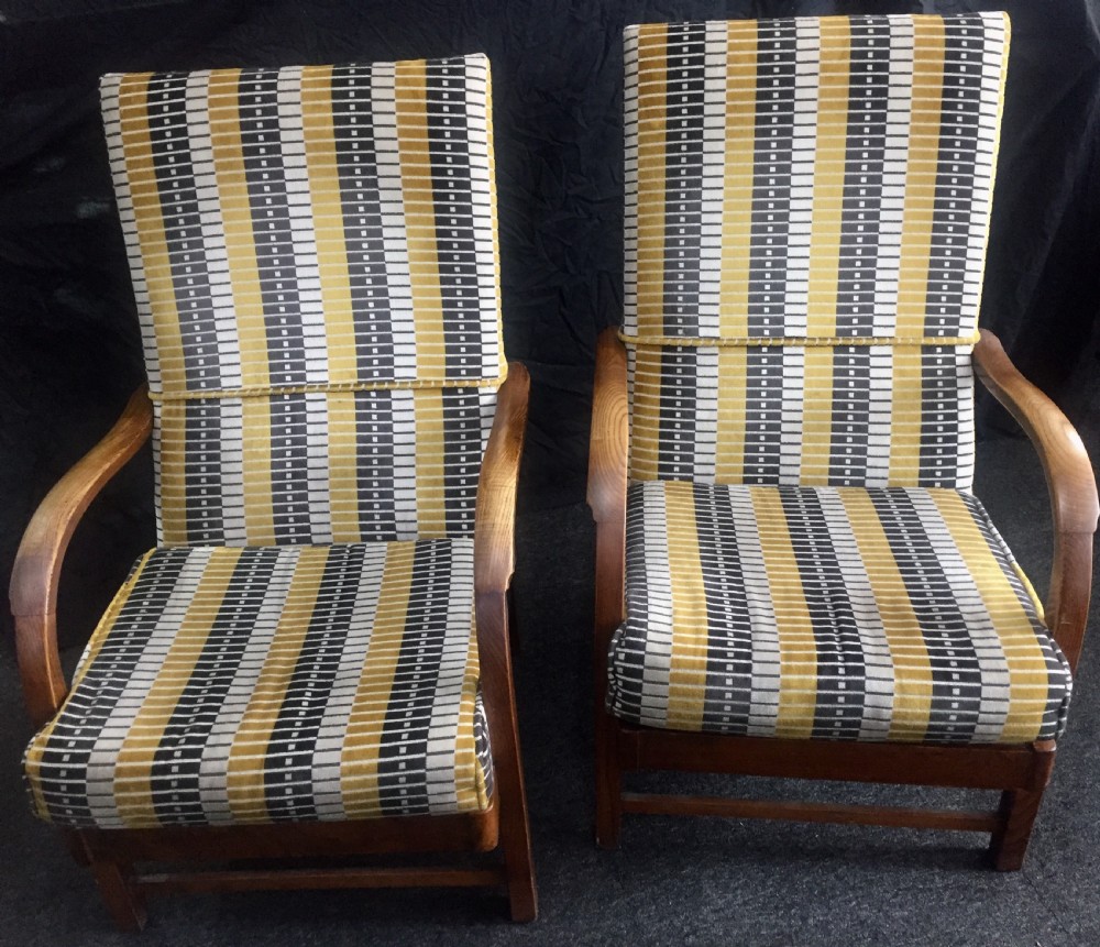 Art Deco lounge chairs reupholstered in London tube line fabric c1930