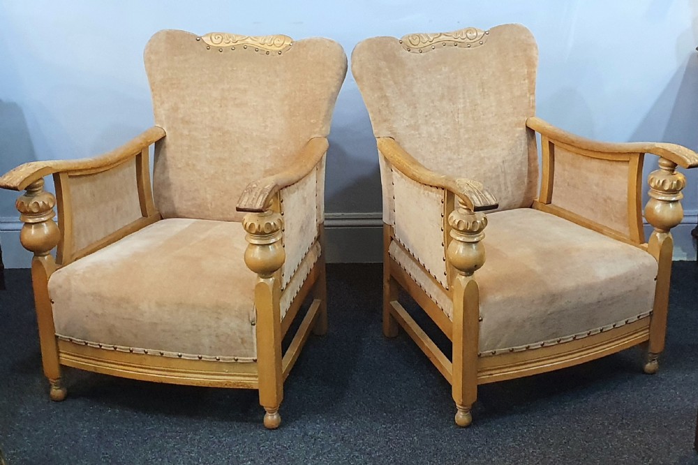 Pair Arts & Crafts Carved Golden Oak & Suede Lounge Chairs c.1910