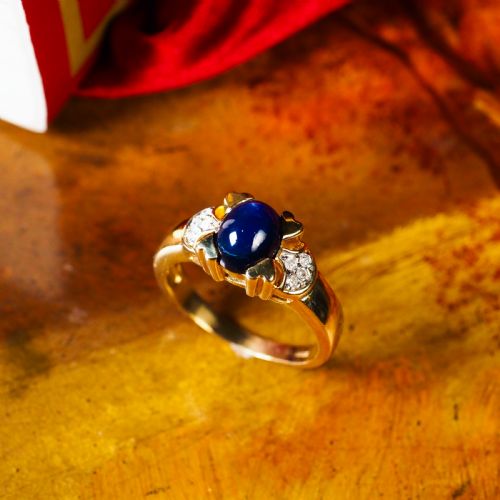 fig 3. A Stylish Vintage 9K Gold Sapphire Cabochon and Diamond Ring