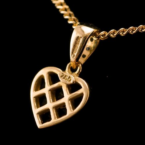 fig 2. A Vintage Ruby & Diamond 18K Gold Heart Shaped Necklace