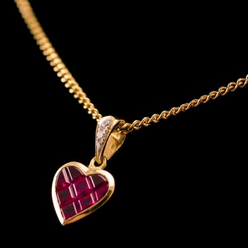 fig 4. A Vintage Ruby & Diamond 18K Gold Heart Shaped Necklace