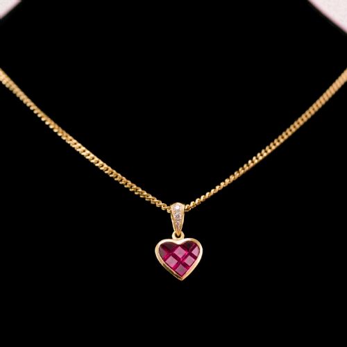 fig 5. A Vintage Ruby & Diamond 18K Gold Heart Shaped Necklace
