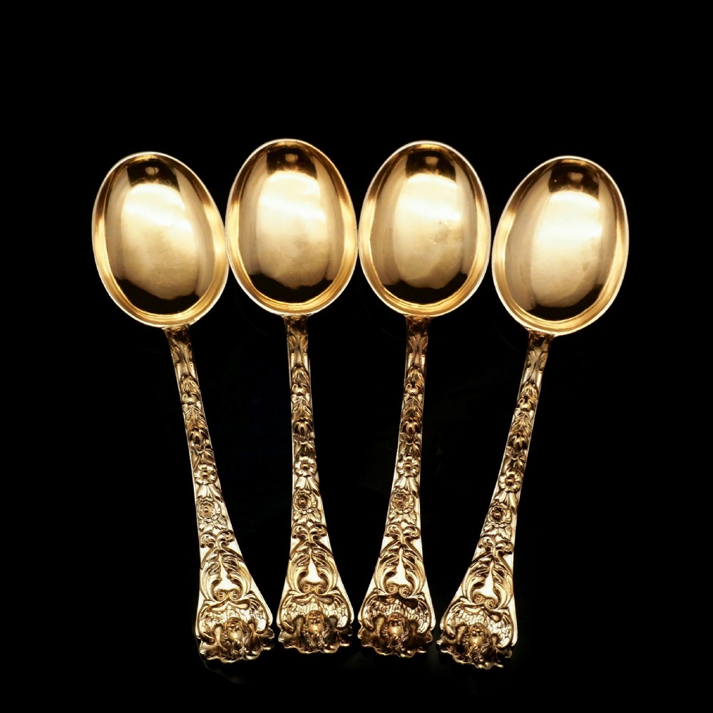 An Antique Set of 4 Solid Silver Gilt Spoons with Highly Embossed Design - Henry William Curry 1871