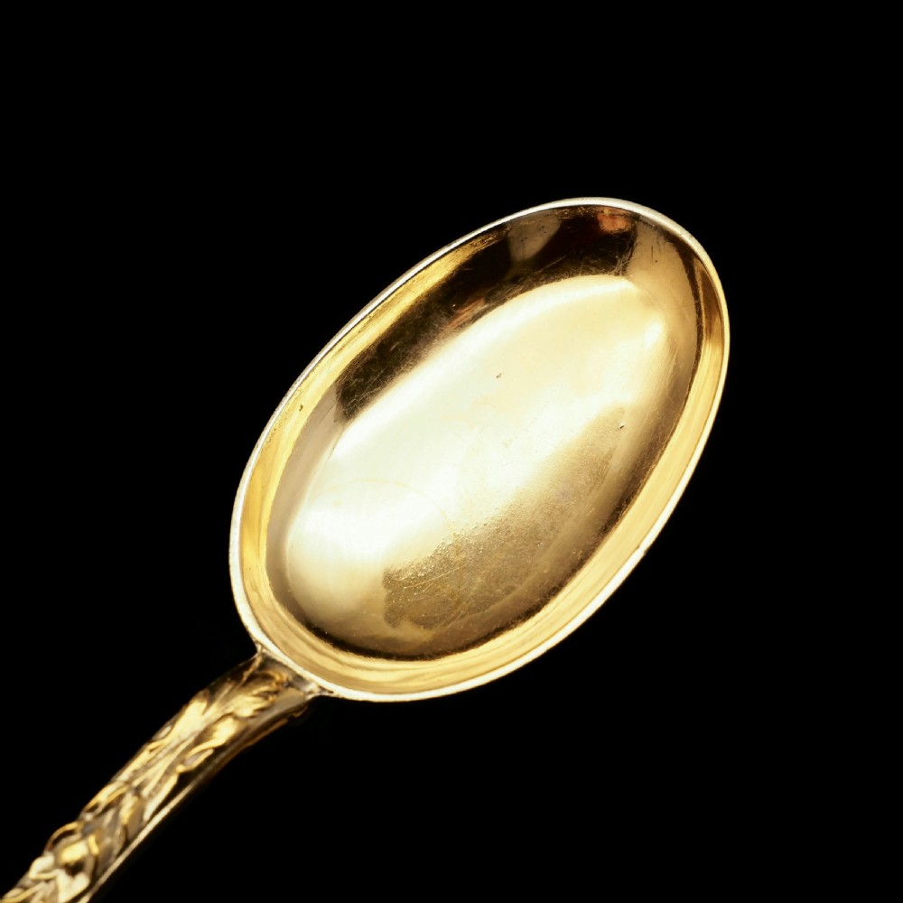 An Antique Set of 4 Solid Silver Gilt Spoons with Highly Embossed Design - Henry William Curry 1871 View III