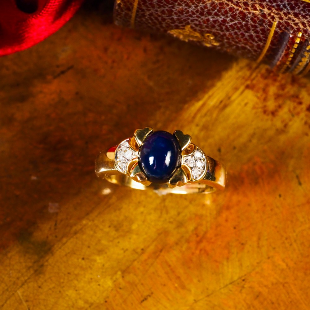 A Stylish Vintage 9K Gold Sapphire Cabochon and Diamond Ring View V