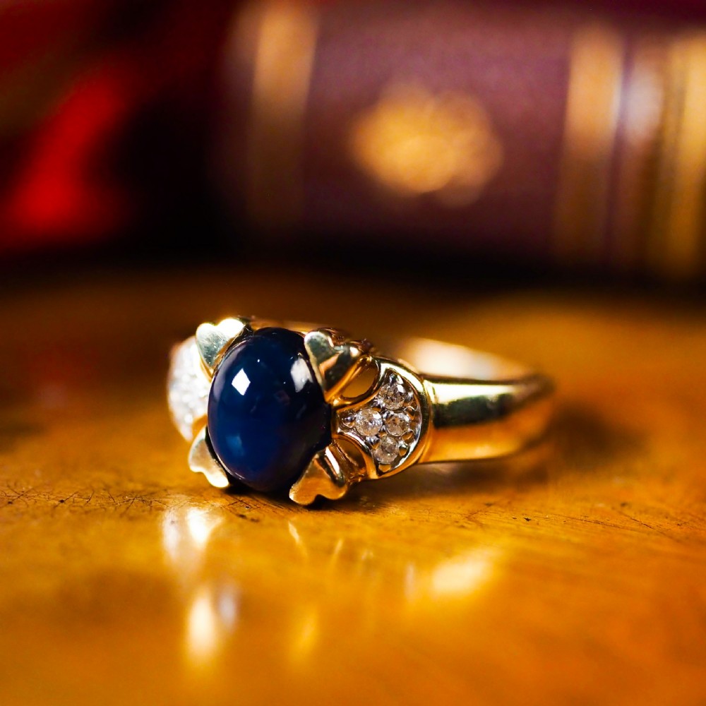A Stylish Vintage 9K Gold Sapphire Cabochon and Diamond Ring View VIII