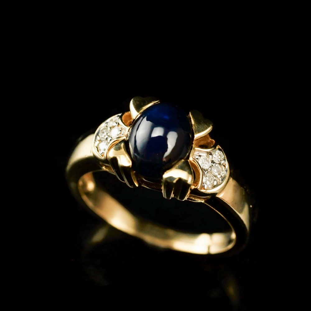 A Stylish Vintage 9K Gold Sapphire Cabochon and Diamond Ring View XI