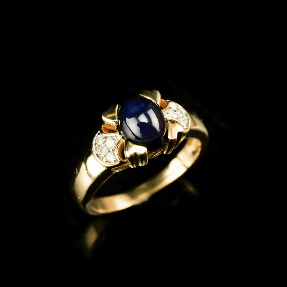 A Stylish Vintage 9K Gold Sapphire Cabochon and Diamond Ring View XII