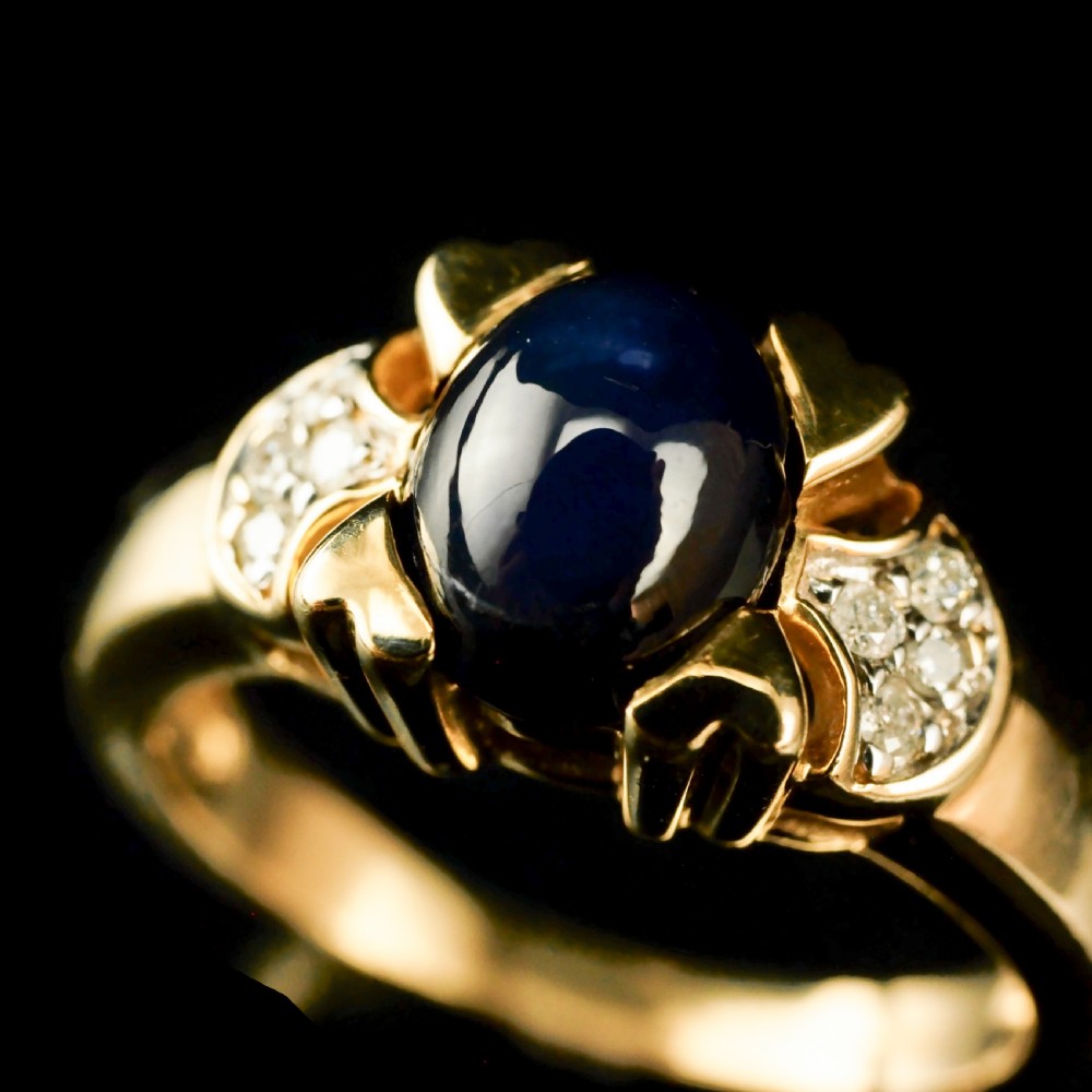 A Stylish Vintage 9K Gold Sapphire Cabochon and Diamond Ring View XIII