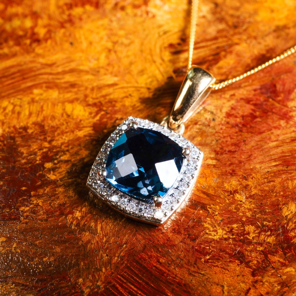 A Stunning Blue Topaz & Diamond Halo Square Necklace 9K Gold