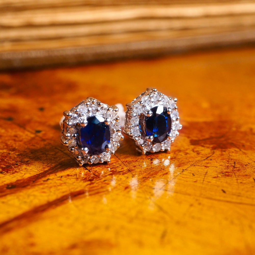 A Pair of Sapphire & Cluster Diamond Earrings 9K White Gold View III