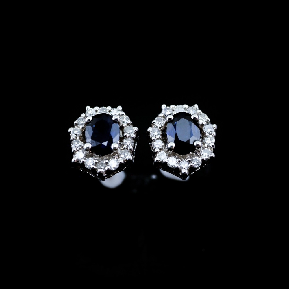 A Pair of Sapphire & Cluster Diamond Earrings 9K White Gold View IV