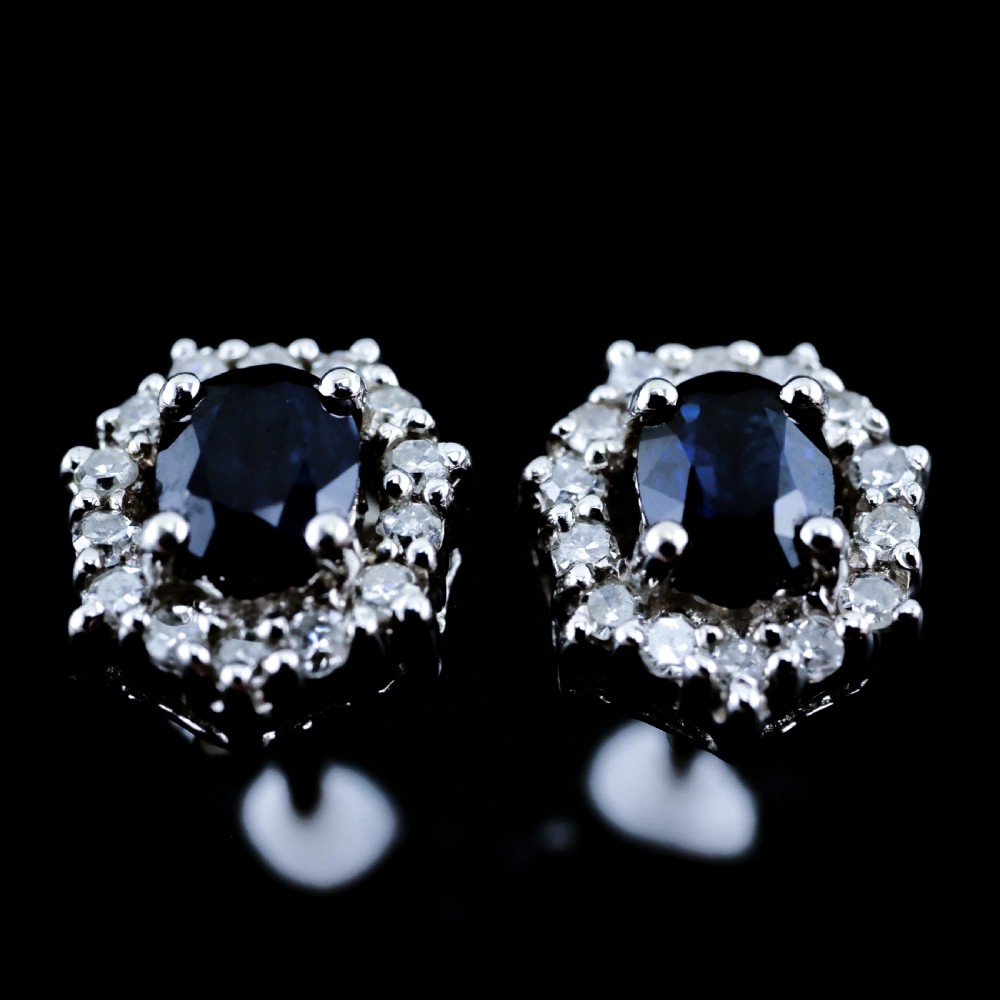 A Pair of Sapphire & Cluster Diamond Earrings 9K White Gold View VII