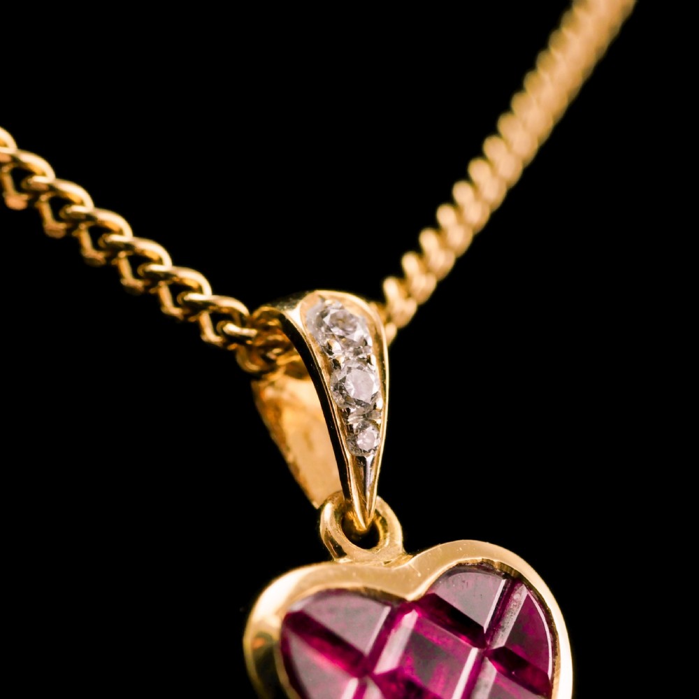 A Vintage Ruby & Diamond 18K Gold Heart Shaped Necklace View IV