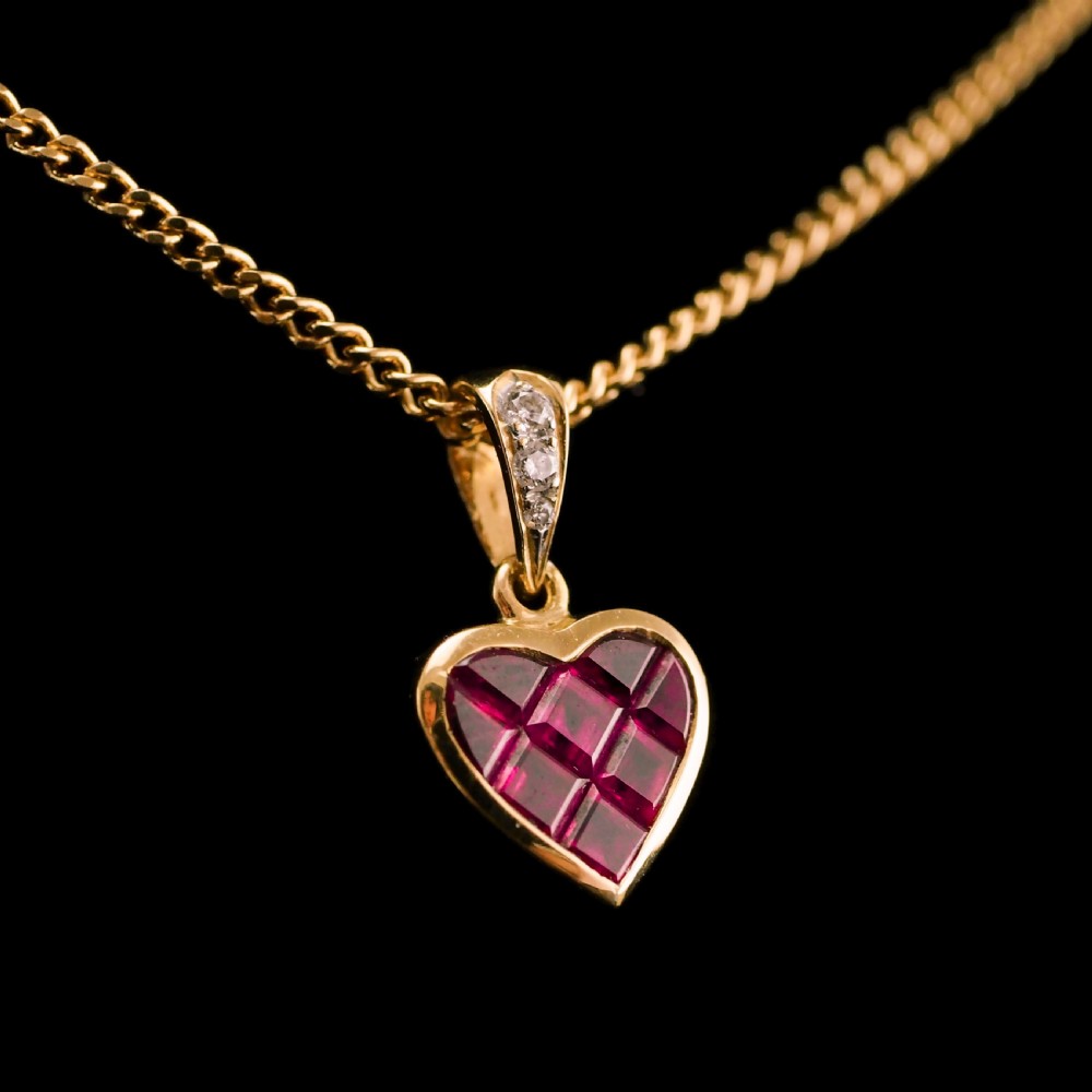 A Vintage Ruby & Diamond 18K Gold Heart Shaped Necklace View VIII