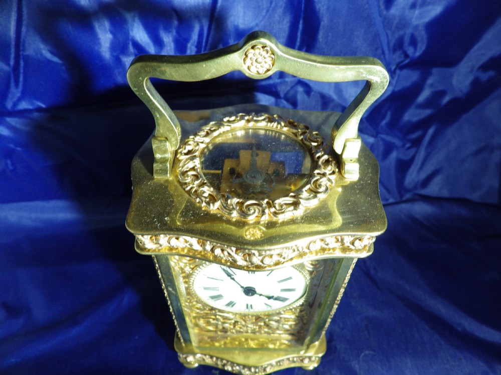 French Carriage Clock Masked Dial and gilded chasing View VI