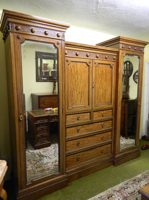 fig 1. mahogany breakfront wardrobe