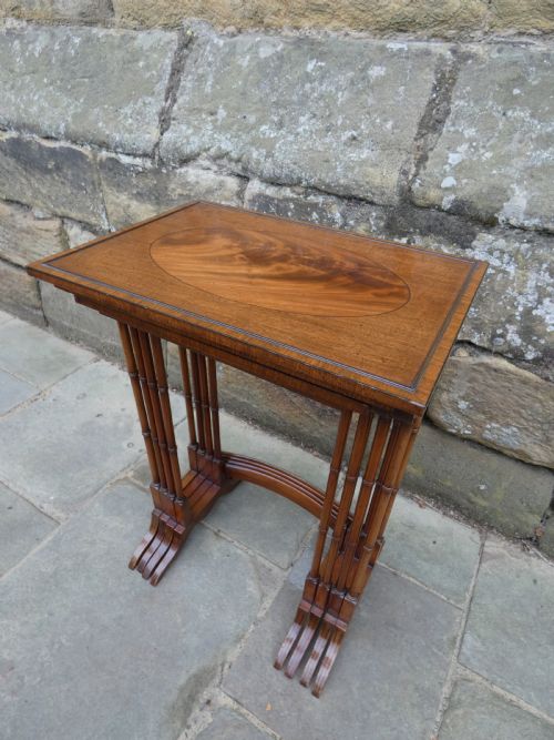 fig 1. Mahogany nest of four tables