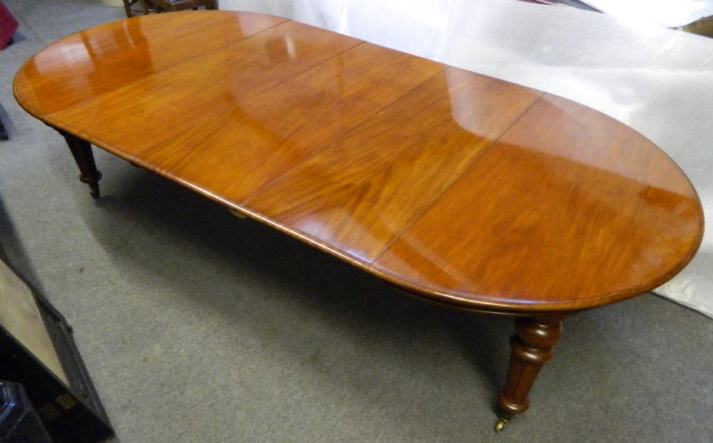 large extending mahogany dining table