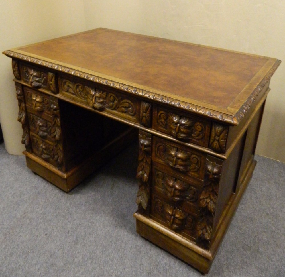 Carved oak green man desk View III