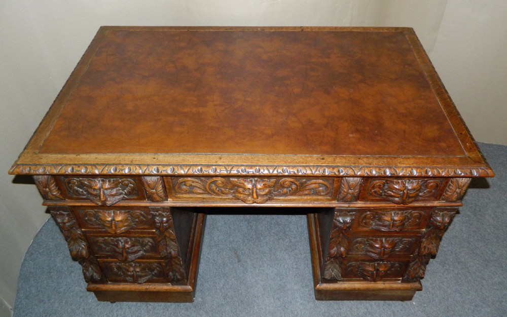Carved oak green man desk View IV