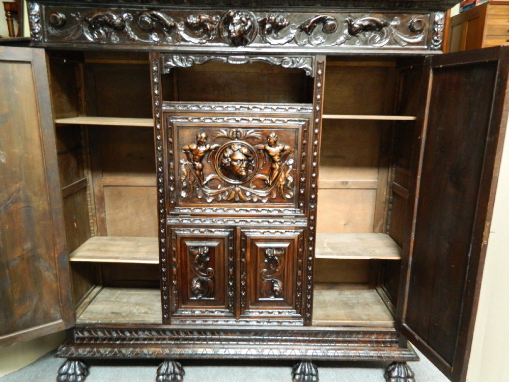 large carved oak cupboard View VI