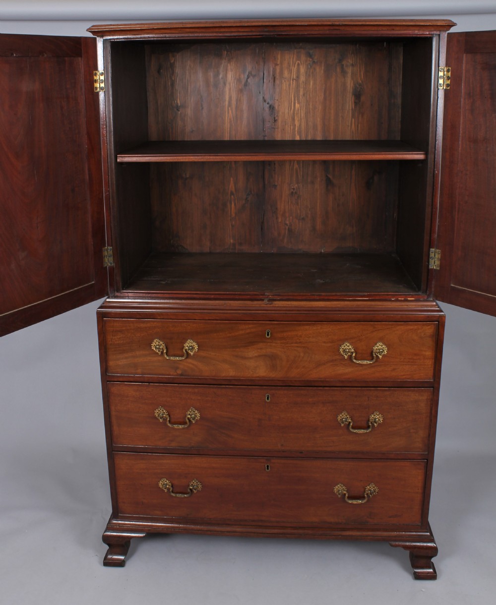 A delightfully small 18th century mahogany cabinet View IV