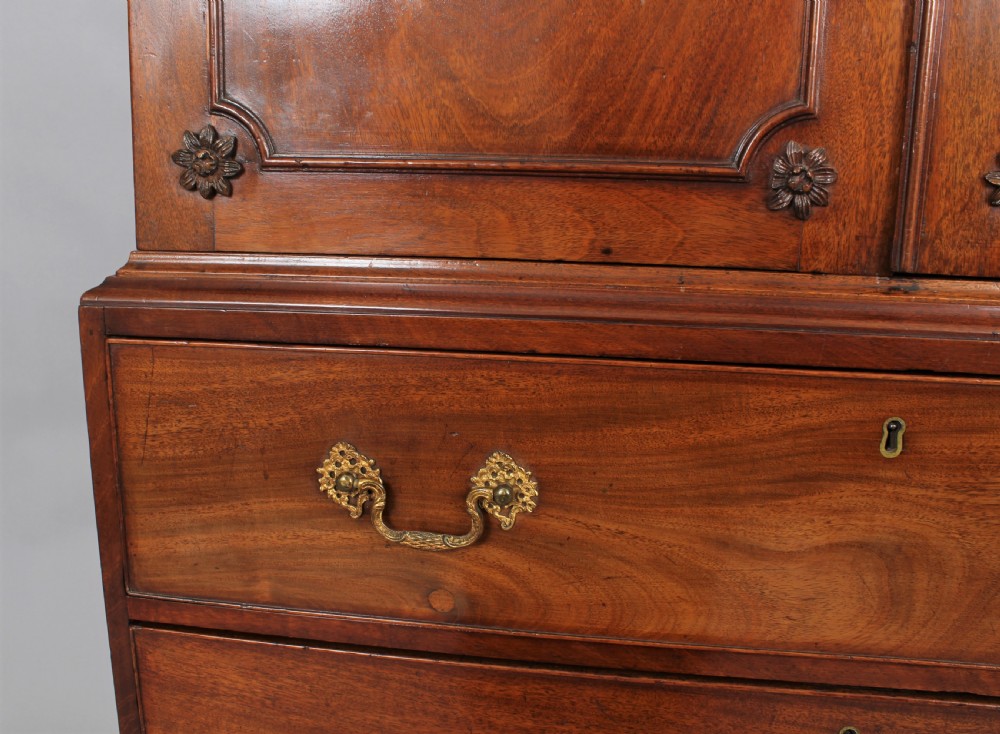 A delightfully small 18th century mahogany cabinet View V