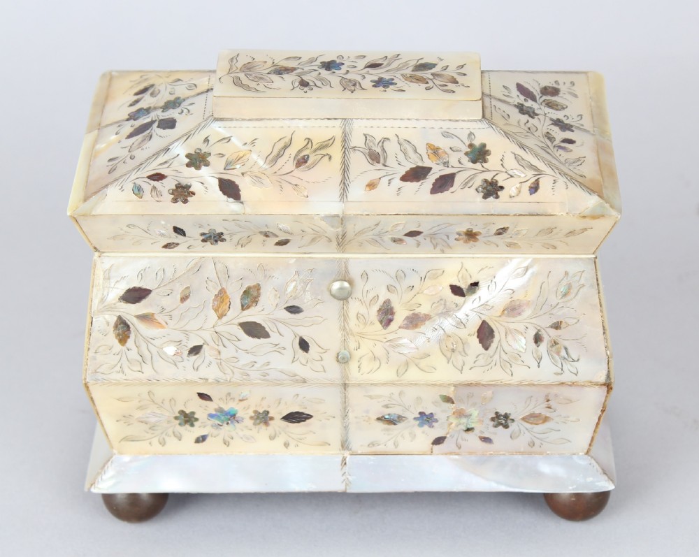 An unusually small early Victorian mother of pearl tea caddy