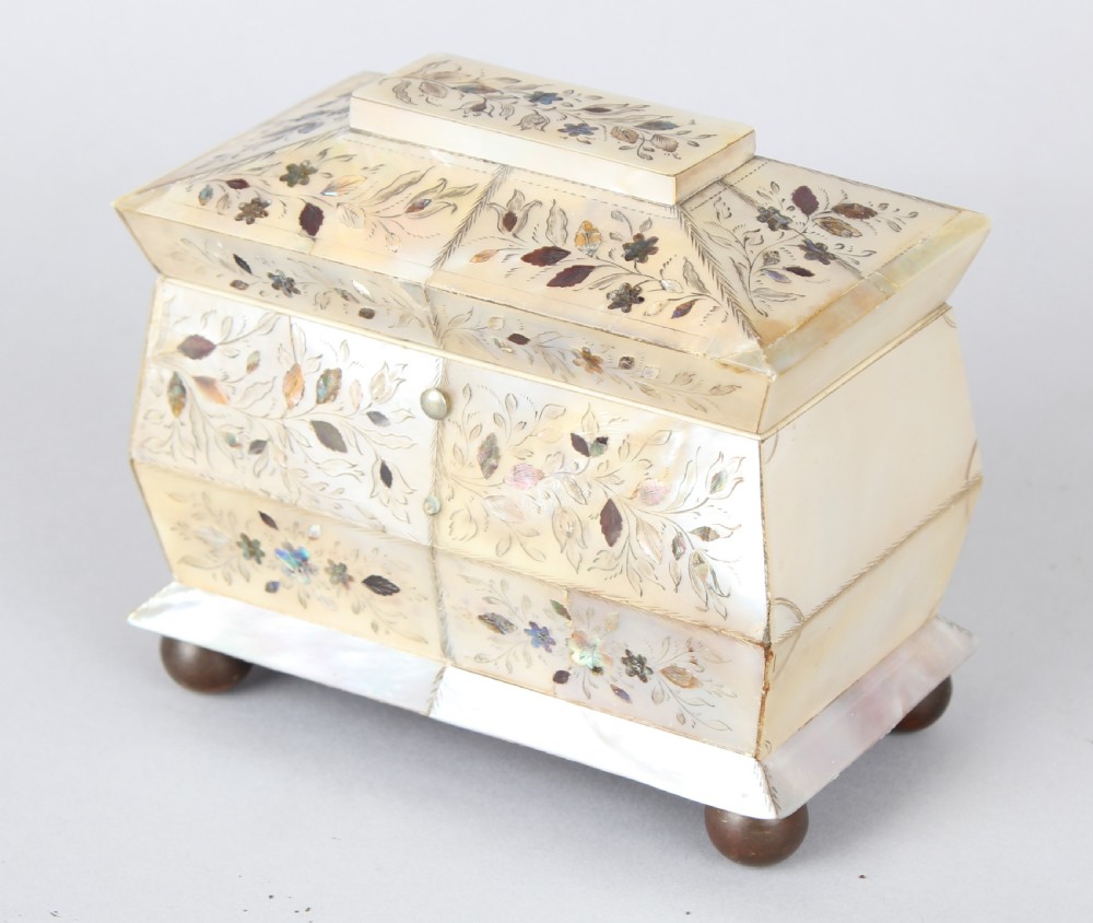 An unusually small early Victorian mother of pearl tea caddy View II