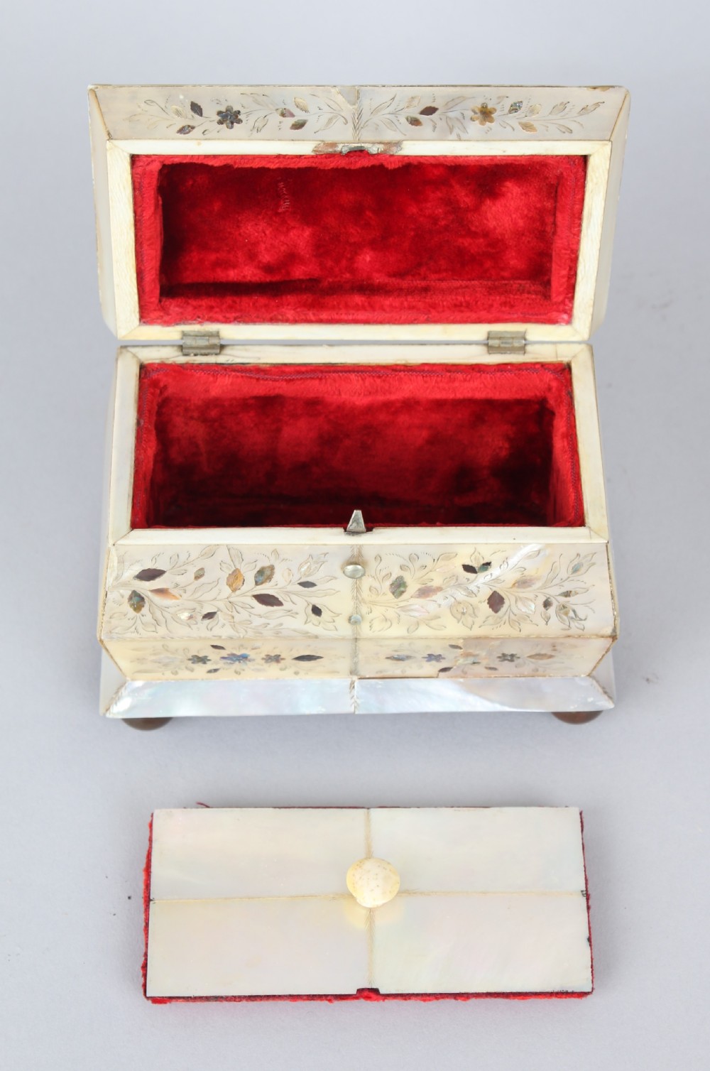 An unusually small early Victorian mother of pearl tea caddy View V