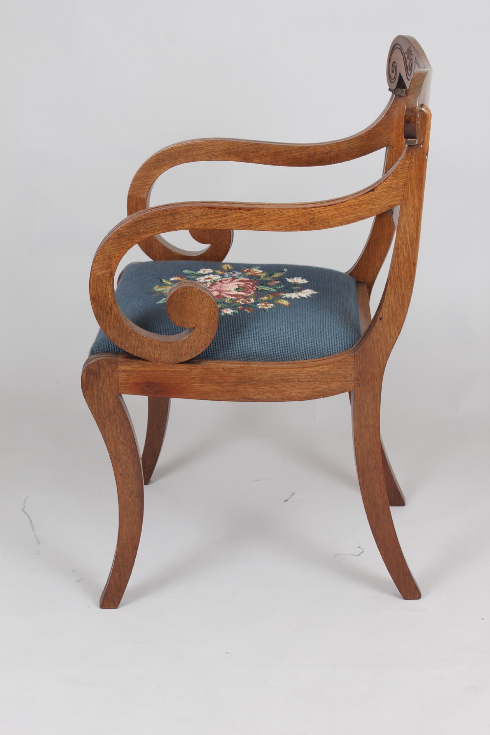 Set of six Regency mahogany sabre leg chairs View V