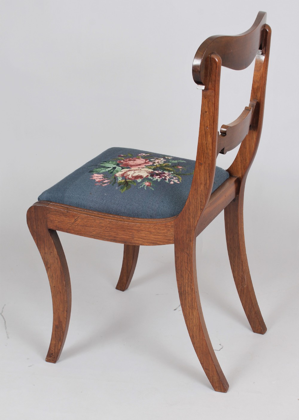 Set of six Regency mahogany sabre leg chairs View VI