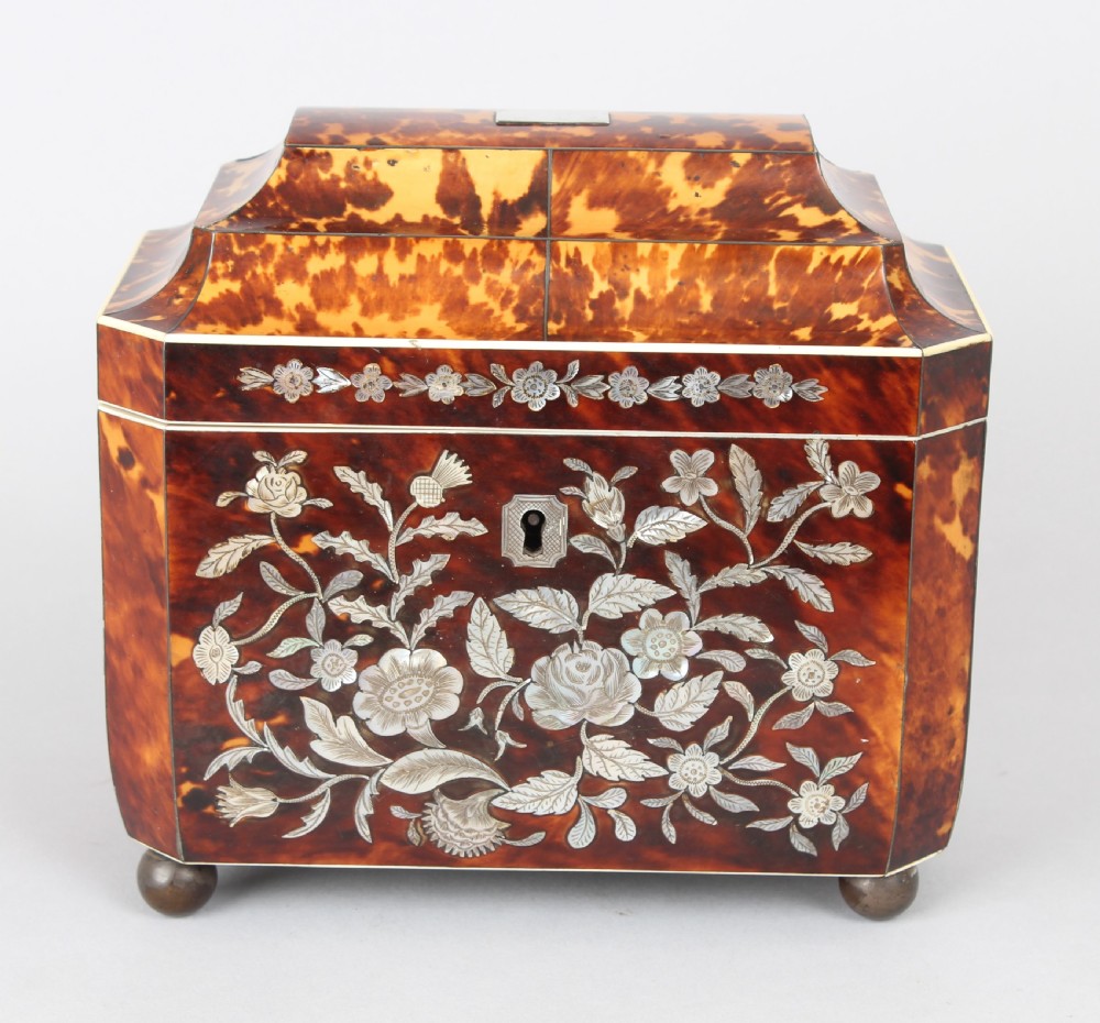 Fine casket shaped well figured tortoiseshell and engraved mother of pearl inlaid tea caddy 