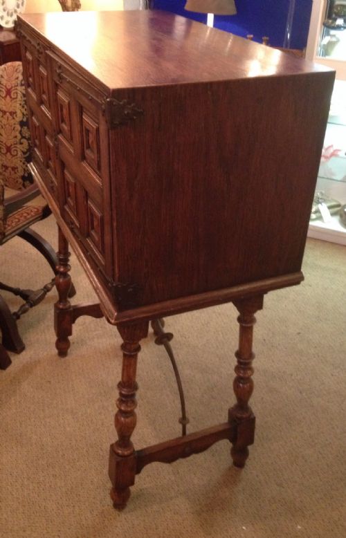 fig 1. Antique Jacobean style Waring and Gillow drinks cabinet in solid oak circa 1910