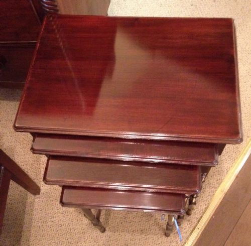 fig 1. Antique Edwardian nest of four tables on turned legs . Repolished
