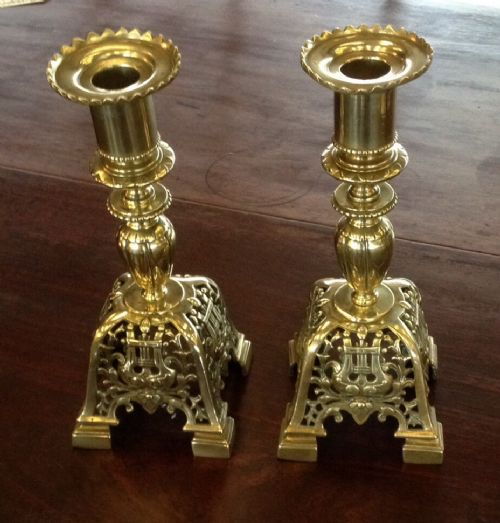 A Pair of Nineteenth Century Brass Arts and Crafts Candlesticks