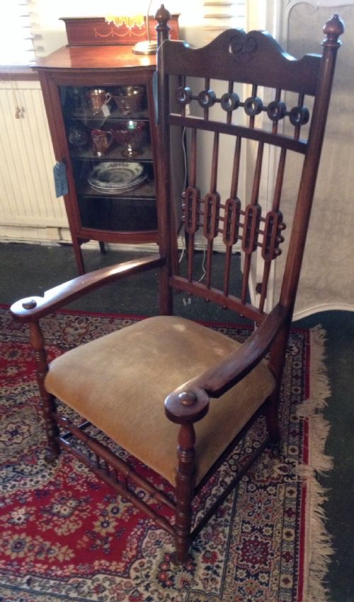 fig 1. Arts and crafts chair in mahogany with open arms circa 1900