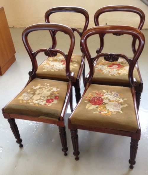 Four Victorian Rosewood Balloon Back Chairs with Original Needlepoint Seats Circa 1860