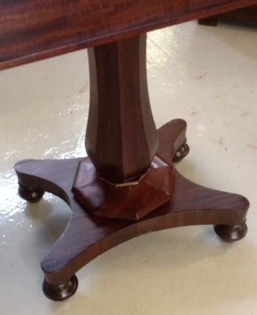 fig 1. Victorian mahogany fold over card table on faceted stem and quadrapartite base circa 1850