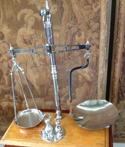 Antique Chrome Scales from the Manchester Coop with Weights .