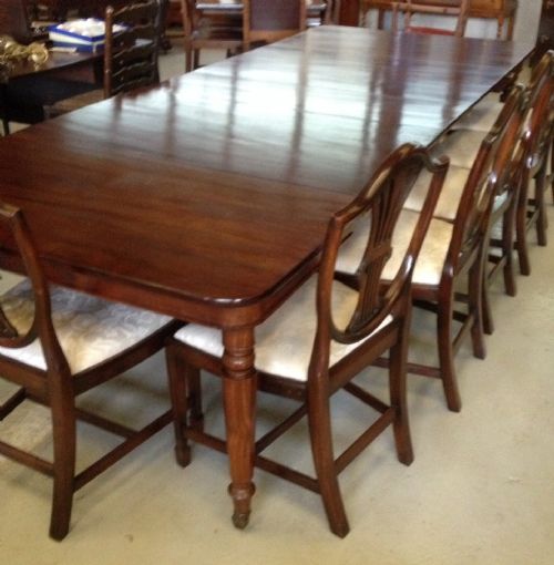 fig 1. Late Georgian pull out eight legged 12 to 14 seater mahogany dining table with three original leaves