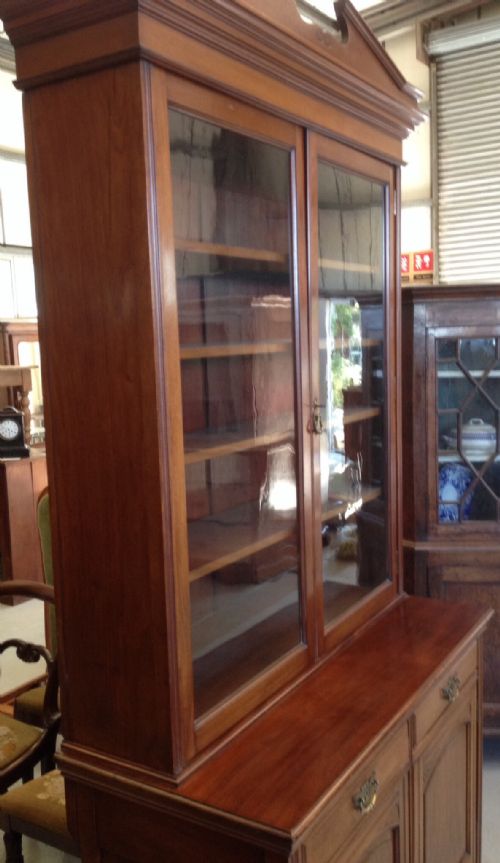 fig 1. Antique Victorian walnut bookcase over cupboards circa 1890