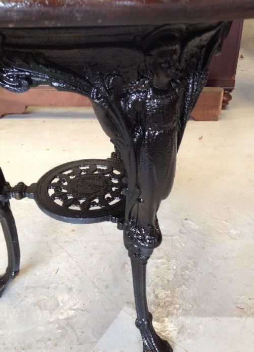 fig 1. Victorian cast iron pub table with mahogany top  by Goodall Burton on Trent 