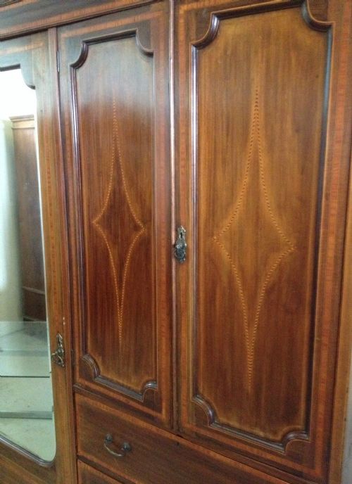 fig 1. Victorian inlaid mahogany compactum wardrobe